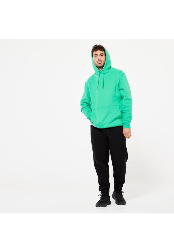 DOMYOS - Spodnie dresowe męskie Domyos Gym & Pilates. Kolor: czarny. Materiał: poliester, bawełna, materiał. Wzór: ze splotem. Sezon: zima. Sport: joga i pilates