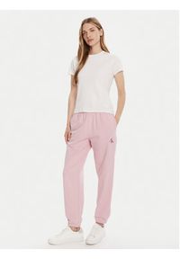 Calvin Klein Jeans Spodnie dresowe Moologo LV047B235G Różowy Regular Fit. Kolor: różowy. Materiał: bawełna #4