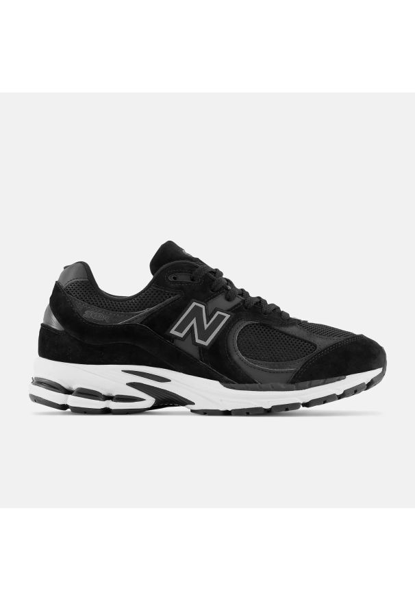 Sneakersy unisex New Balance M2002RBK Czarny. Kolor: czarny. Materiał: guma, syntetyk, skóra, materiał. Szerokość cholewki: normalna. Sport: turystyka piesza