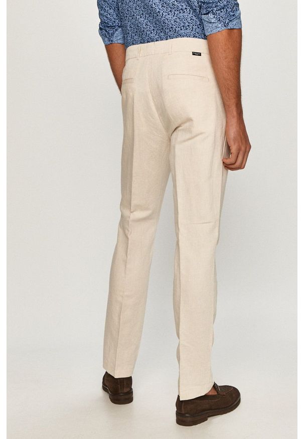 Marciano Guess - Spodnie. Kolor: beżowy. Materiał: tkanina. Wzór: gładki