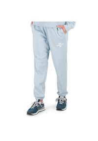 Spodnie New Balance WP31508LAY - niebieskie. Kolor: niebieski. Materiał: bawełna, dresówka, poliester