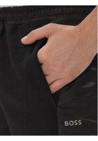 BOSS - Boss Spodnie dresowe Hadikon 50504888 Czarny Relaxed Fit. Kolor: czarny. Materiał: bawełna