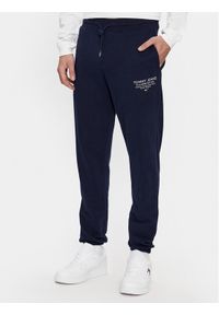 Tommy Jeans Spodnie dresowe Entry Graphic DM0DM18357 Granatowy Slim Fit. Kolor: niebieski. Materiał: bawełna