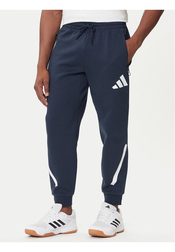 Adidas - adidas Spodnie dresowe Z.N.E. JW4723 Granatowy Loose Fit. Kolor: niebieski. Materiał: syntetyk, bawełna