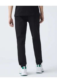 Lacoste - LACOSTE - Czarne spodnie dresowe z logowaną lamówką. Kolor: czarny. Materiał: dresówka. Wzór: haft #2