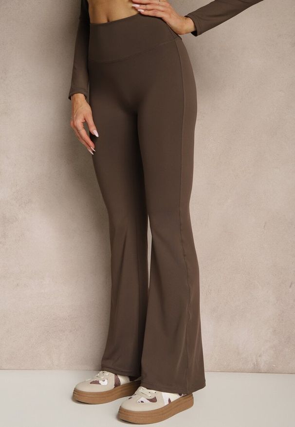 Renee - Brązowe Legginsy Dzwony High Waist Orruvana. Stan: podwyższony. Kolor: brązowy. Materiał: tkanina