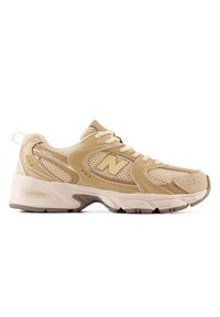 Buty dziecięce New Balance G5303QO – beżowe. Okazja: na co dzień, na uczelnię. Kolor: beżowy. Materiał: guma, skóra. Szerokość cholewki: normalna #1