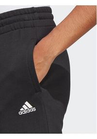 Adidas - adidas Spodnie dresowe Essentials Linear French Terry Cuffed Joggers IC6868 Czarny Slim Fit. Kolor: czarny. Materiał: bawełna #3