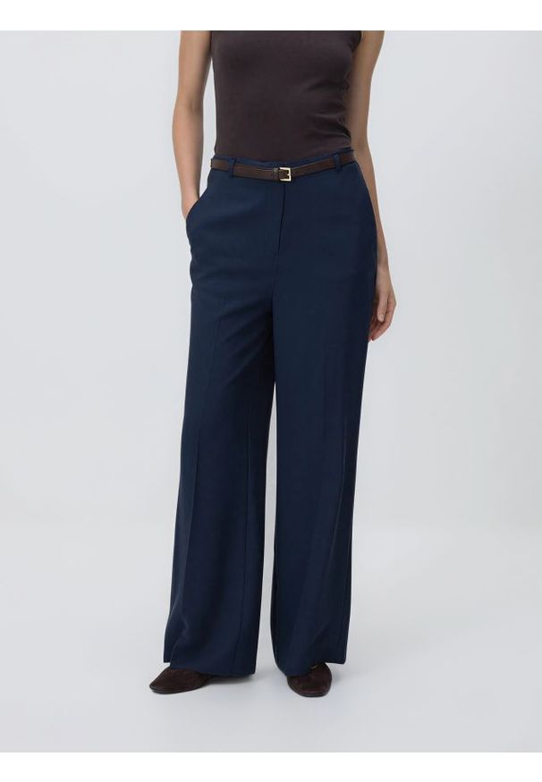 Reserved - Spodnie z modalem - granatowy. Kolor: niebieski. Materiał: tkanina