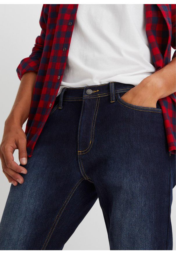 bonprix - Dżinsy termiczne regular fit, prosta nogawka, z ocieplaną stroną wewnętrzną. Kolor: niebieski