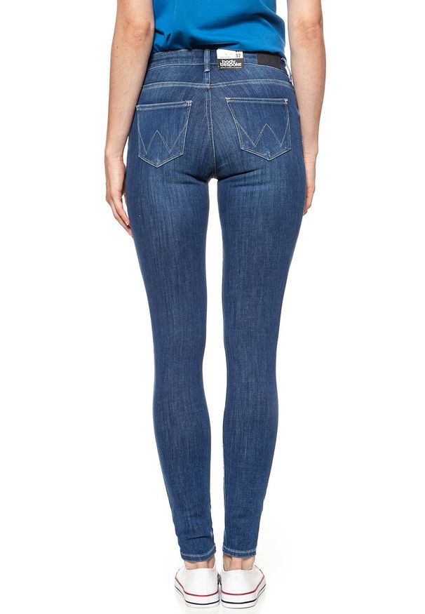 Wrangler - WRANGLER SUPER SKINNY SUMMER SKY W29JGT12W 112128559. Długość: długie. Wzór: aplikacja, ażurowy. Sezon: lato. Styl: sportowy, klasyczny