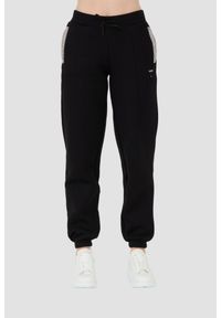 Guess - GUESS Czarne damskie spodnie dresowe Kiara Pant, Rozmiar S. Kolor: czarny. Materiał: dresówka