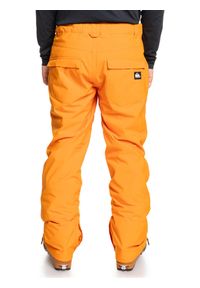 Quiksilver - Spodnie śnieżne dla Mężczyzn ESTATE. Kolor: pomarańczowy, wielokolorowy, żółty. Materiał: poliester. Sezon: zima. Sport: narciarstwo