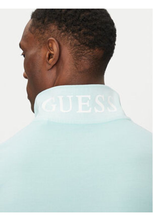 Guess Polo F5GP00 K9WF1 Niebieski Regular Fit. Typ kołnierza: polo. Kolor: niebieski. Materiał: bawełna