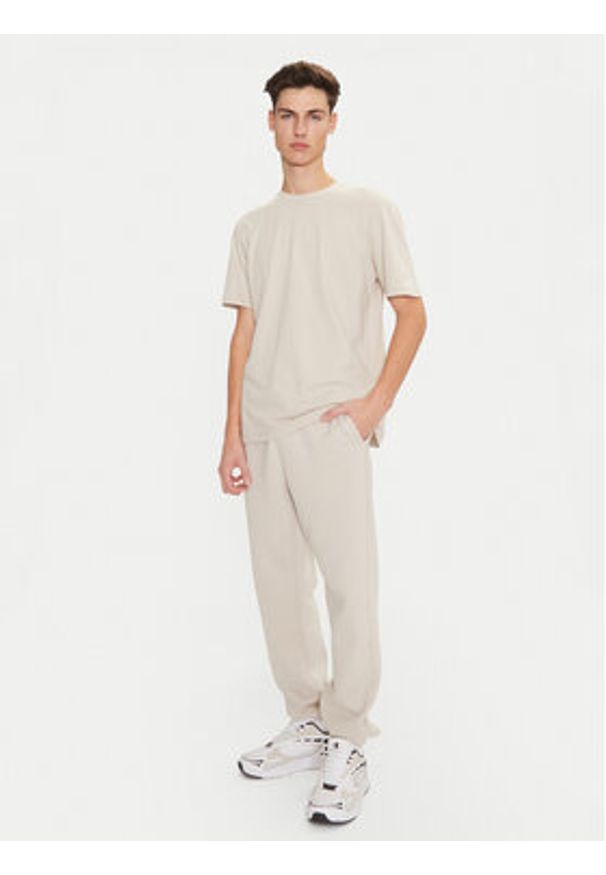 Champion T-Shirt 220425 Écru Regular Fit. Materiał: bawełna