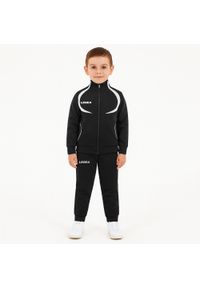 LEGEA - Komplet dresowy dla chłopca SINGAPORE JR. Okazja: na uczelnię. Kolor: czarny, wielokolorowy, biały. Materiał: dresówka. Styl: sportowy #1