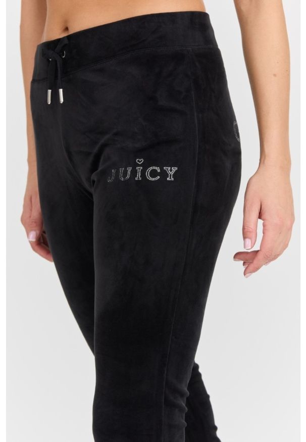 Juicy Couture - JUICY COUTURE Czarne damskie spodnie dresowe Lisa Regal. Kolor: czarny. Materiał: dresówka. Długość: długie