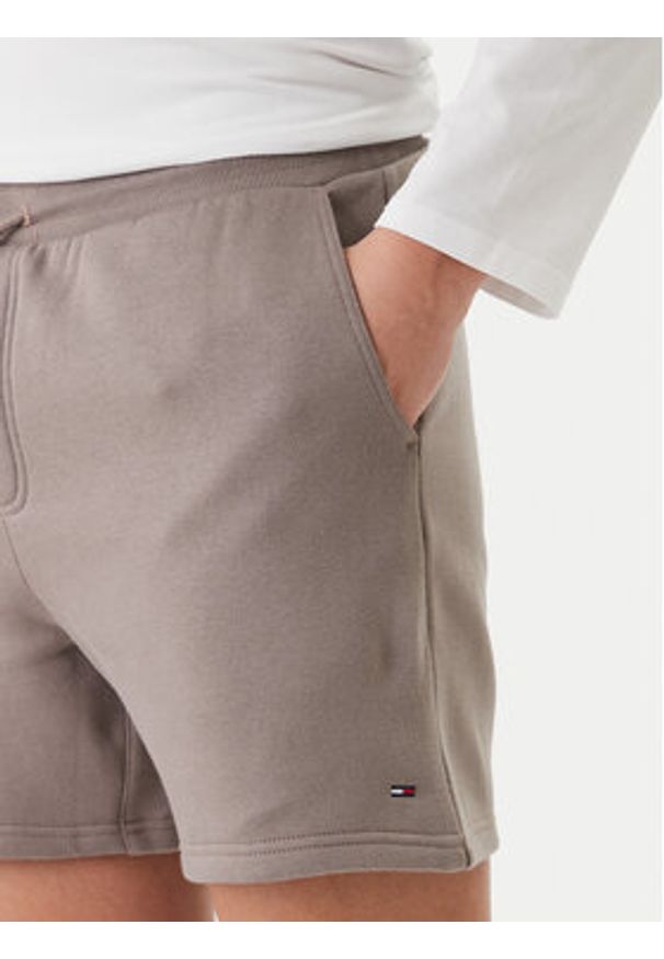 Tommy Jeans Szorty sportowe DM0DM21931 Beżowy Regular Fit. Kolor: beżowy. Materiał: bawełna. Styl: sportowy