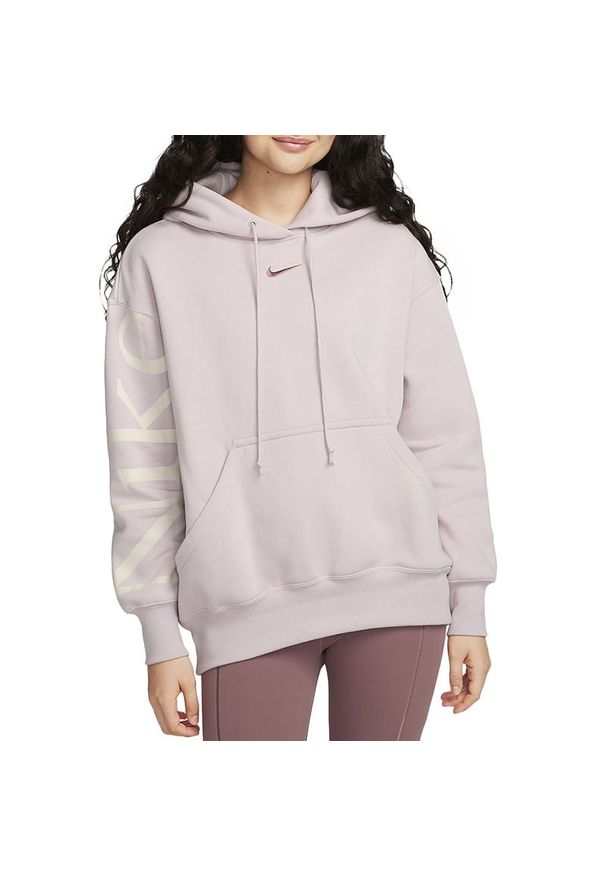 Bluza Nike Sportswear Phoenix Fleece FQ7042-019 - różowa. Typ kołnierza: kaptur. Kolor: różowy. Materiał: bawełna, tkanina, poliester. Długość rękawa: raglanowy rękaw. Styl: klasyczny, sportowy