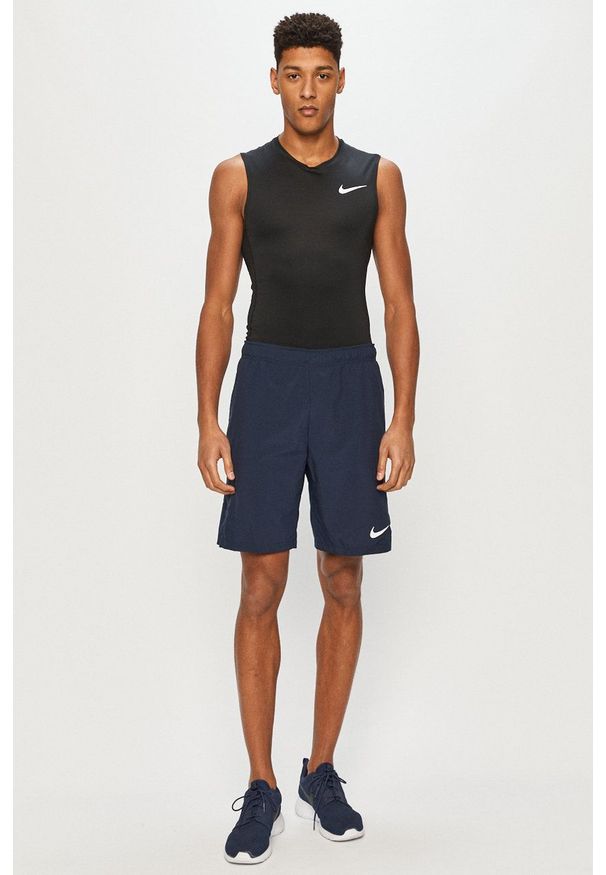 Nike - T-shirt. Kolor: czarny. Materiał: tkanina, dzianina, skóra, włókno