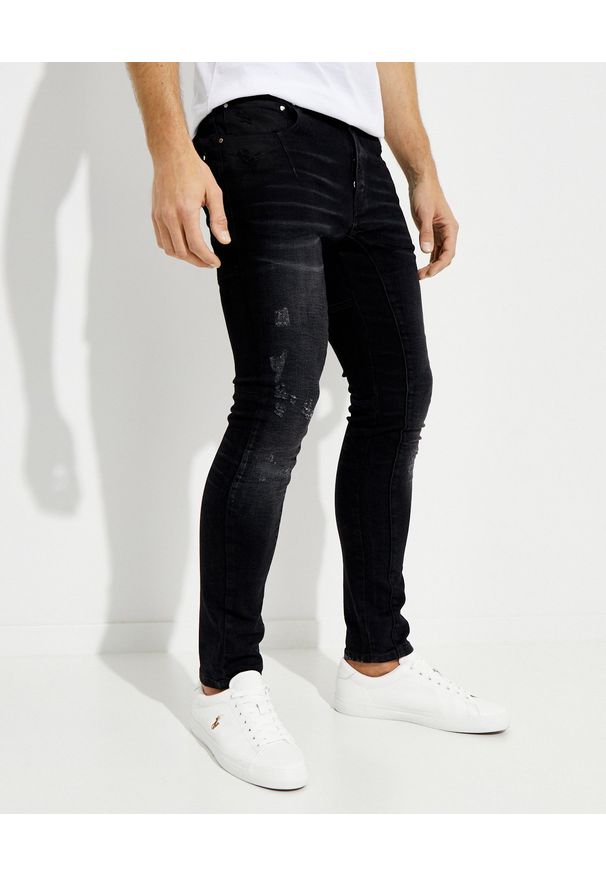 Les Hommes - LES HOMMES - Czarne jeansy z przetarciami. Okazja: na co dzień. Kolor: czarny. Styl: casual