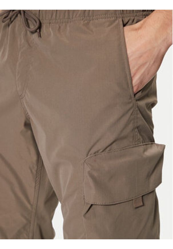 Jack & Jones - Jack&Jones Spodnie materiałowe Kane 12269391 Brązowy Relaxed Fit. Kolor: brązowy. Materiał: syntetyk