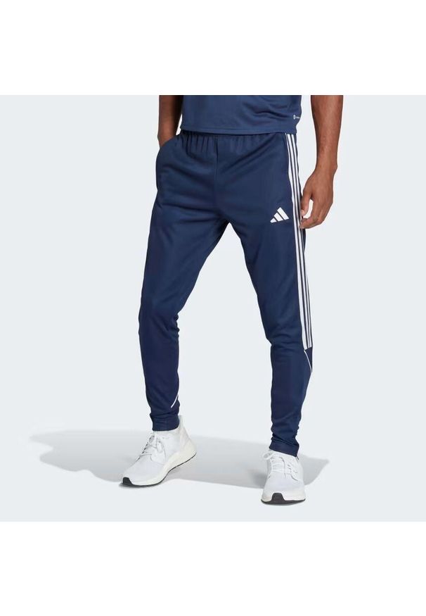 Adidas - Spodnie męskie adidas Tiro 23 League Training. Kolor: niebieski