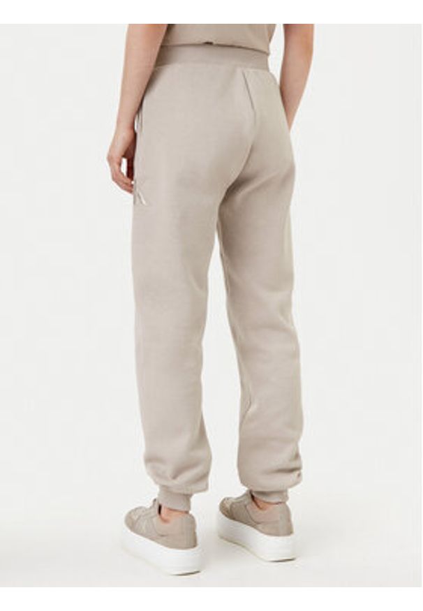 Calvin Klein Jeans Spodnie dresowe Raised J20J224841 Szary Relaxed Fit. Kolor: szary. Materiał: syntetyk