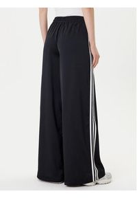 Adidas - adidas Spodnie dresowe adicolor Satin IU2520 Czarny Wide Leg. Kolor: czarny. Materiał: syntetyk #3