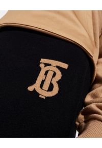 Burberry - BURBERRY - Kaszmirowe spodnie z monogramem. Kolor: czarny. Materiał: kaszmir