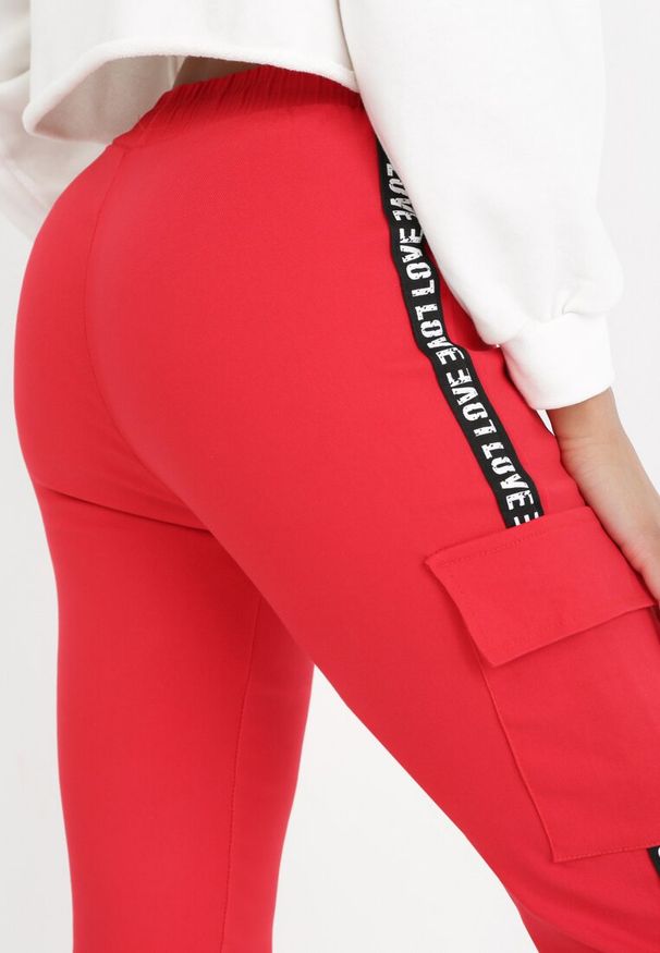 Born2be - Czerwone Spodnie Ionomeda. Kolor: czerwony. Materiał: tkanina. Wzór: jednolity, nadruk