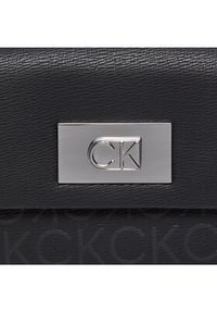 Calvin Klein Torebka Ck Push Shoulder Bag_Epi Mn K60K612143 Czarny. Kolor: czarny. Materiał: skórzane
