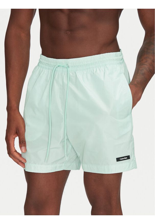 Calvin Klein Swimwear Szorty kąpielowe KM0KM01111 Zielony Regular Fit. Kolor: zielony. Materiał: syntetyk