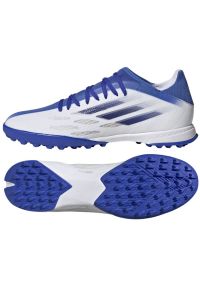 Adidas - Buty piłkarskie adidas X Speedflow.3 Tf M GW7509 białe. Zapięcie: sznurówki. Kolor: biały. Materiał: guma, włókno. Szerokość cholewki: normalna. Sezon: lato. Sport: piłka nożna