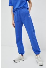 Champion spodnie dresowe kolor niebieski gładkie. Kolor: niebieski. Materiał: dresówka. Wzór: gładki