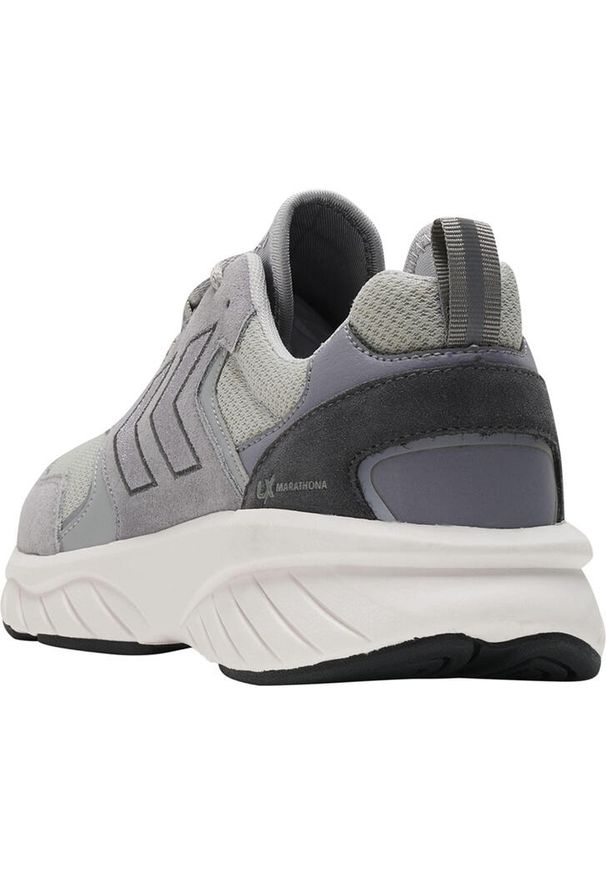 Trenerzy Hummel Marathona Reach LX. Kolor: szary. Szerokość cholewki: normalna. Wzór: jodełka, haft