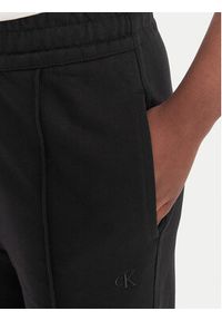 Calvin Klein Jeans Spodnie dresowe Archive Logo LV047B240G Czarny Regular Fit. Kolor: czarny. Materiał: bawełna #4