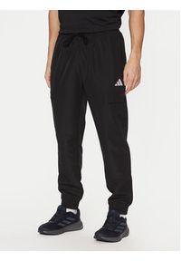 Adidas - adidas Dres Sportswear Woven Cargo JI8888 Czarny Regular Fit. Kolor: czarny. Materiał: syntetyk