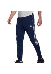 Adidas - Spodnie adidas Tiro 21 Track Pant M GE5425. Kolor: wielokolorowy, niebieski, biały