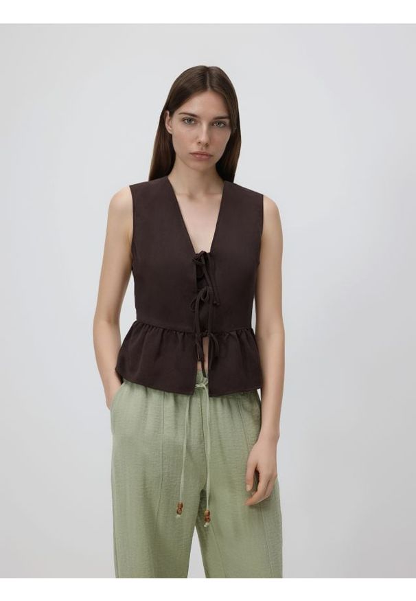 Reserved - Spodnie z wiskozą - jasnozielony. Kolor: zielony. Materiał: wiskoza