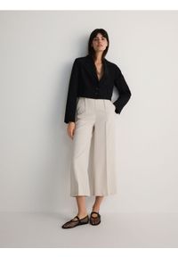 Reserved - Spodnie culotte z wiskozą - beżowy. Kolor: beżowy. Materiał: wiskoza. Wzór: gładki #1