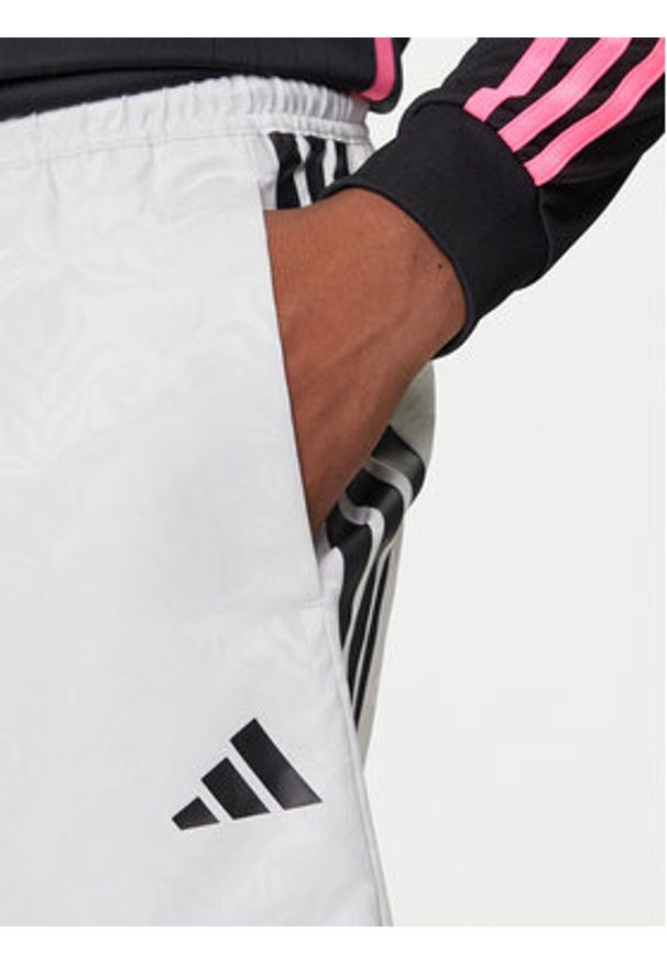 Adidas - adidas Szorty sportowe Common Goal JW0239 Szary Regular Fit. Kolor: szary. Materiał: syntetyk. Styl: sportowy