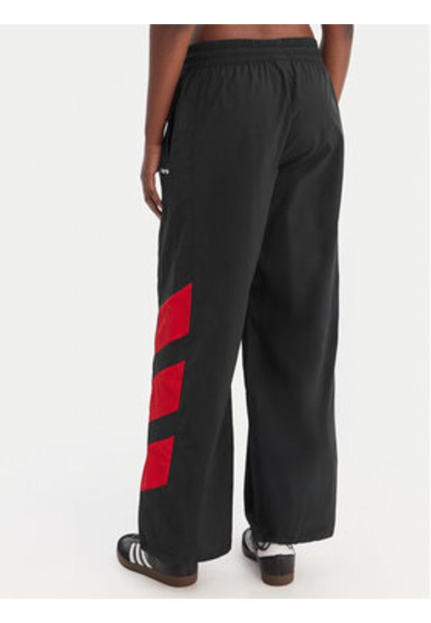 Adidas - adidas Spodnie dresowe Blocked Washed KE5037 Szary Loose Fit. Kolor: szary. Materiał: syntetyk