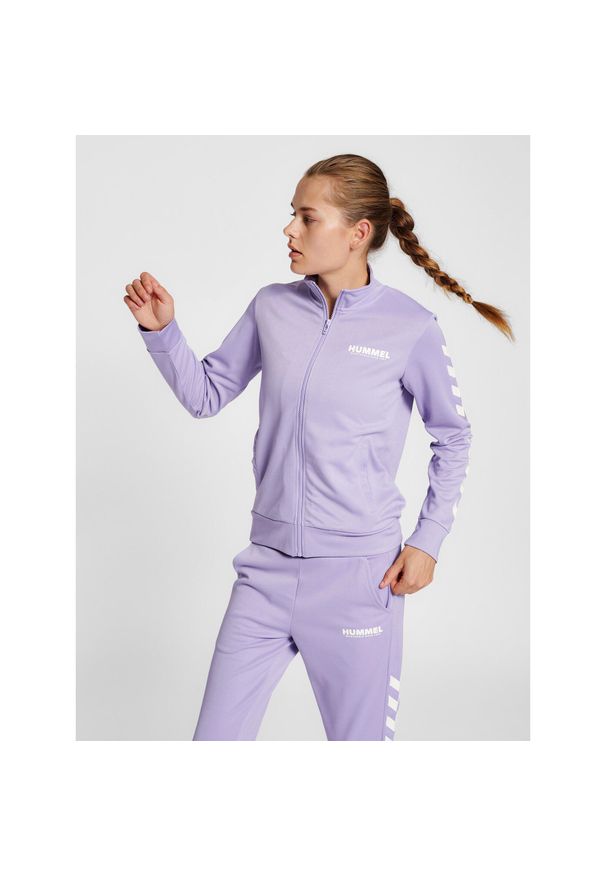 Damska bluza dresowa zapinana na zamek Hummel Legacy. Kolor: różowy, wielokolorowy, fioletowy. Materiał: dresówka. Sport: piłka ręczna