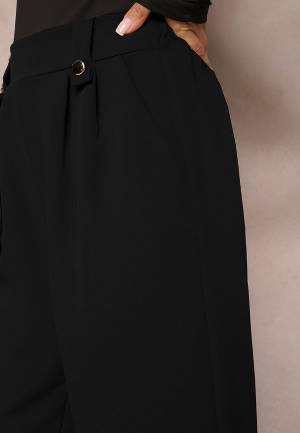 Renee - Czarne Eleganckie Spodnie Dzwony z Ozdobnymi Patkami w Pasie Nattas. Stan: podwyższony. Kolor: czarny. Styl: elegancki