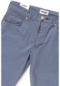 Wrangler - WRANGLER SPODNIE MĘSKIE GREENSBORO FLINSTONE BLUE W15QMM13F. Materiał: materiał