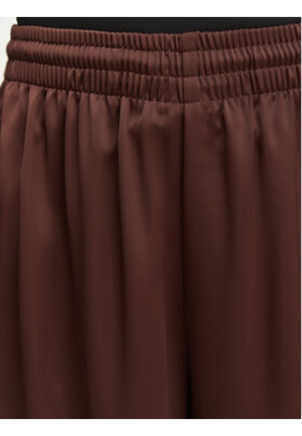 Adidas - adidas Spodnie dresowe adicolor Satin KD2541 Brązowy Wide Leg. Kolor: brązowy. Materiał: syntetyk