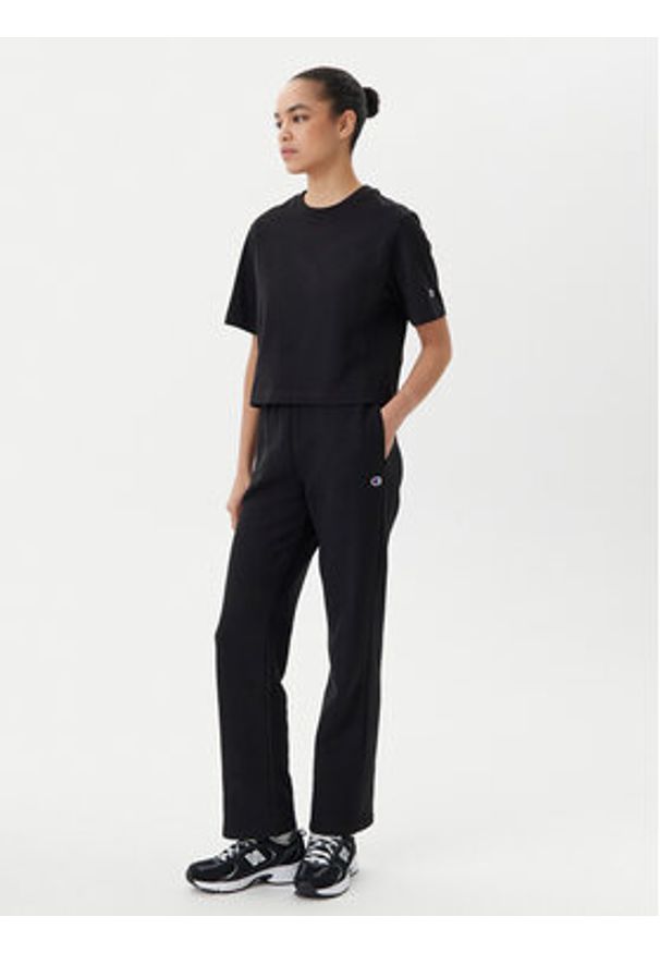 Champion Spodnie dresowe 117983 Czarny Slim Fit. Kolor: czarny. Materiał: bawełna