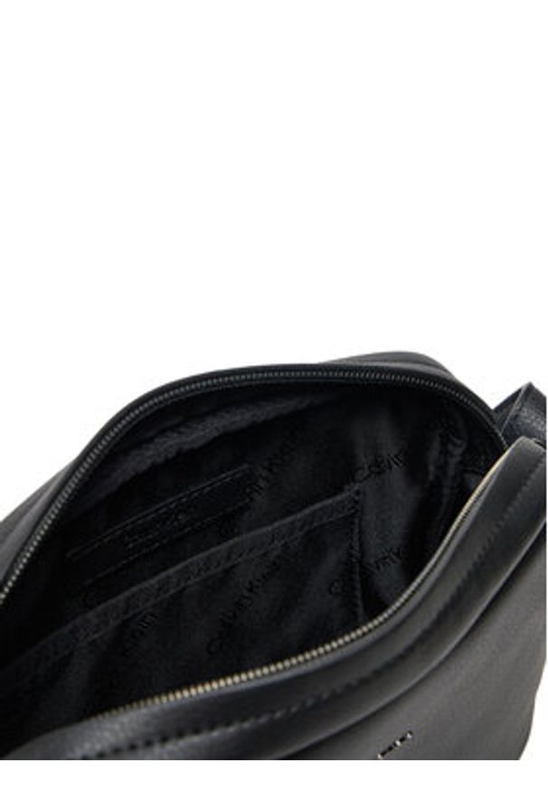 Calvin Klein Saszetka Modern Business Flat Camera Bag K50K512905 Czarny. Kolor: czarny. Materiał: skóra