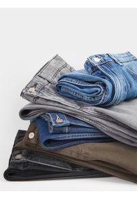 Reserved - Jeansy wide leg - niebieski. Kolor: niebieski